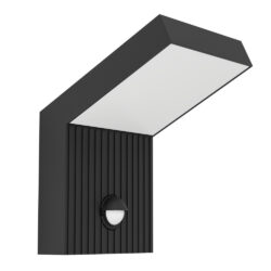 Black angled outdoor wall light with a ribbed front panel and round white light at the base of the panel.