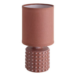 Pink cylindrical lamp with a textured, studded base and a fabric shade