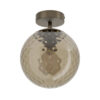 Bronze ceiling mount with a large, textured amber glass globe light fixture hanging from the ceiling