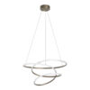 Modern pendant light with two interlocking circular rings hanging from ceiling mount, bronze and white finish, decorative ceiling fixture.