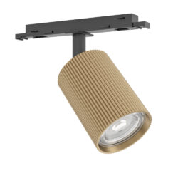 Gold ribbed cylindrical track light fixture mounted to a ceiling rail, providing directional lighting on a track system.